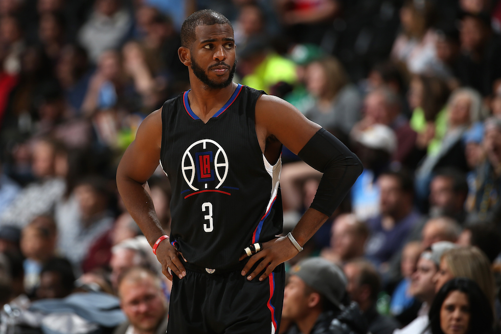 Chris Paul looks on during a game against the Nuggets