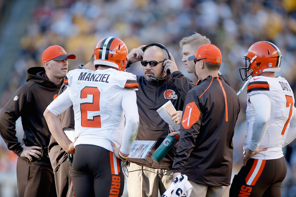 Johnny Manziel chats with the Cleveland staff