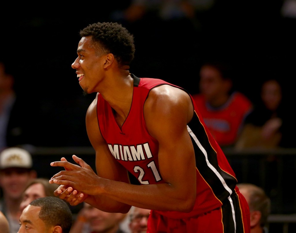 Hassan Whiteside claps after scoring a point.