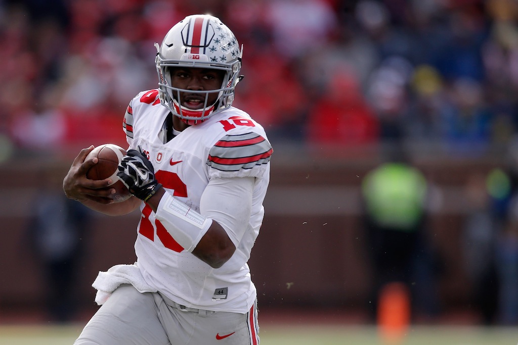 J.T. Barrett rushes the ball against Michigan