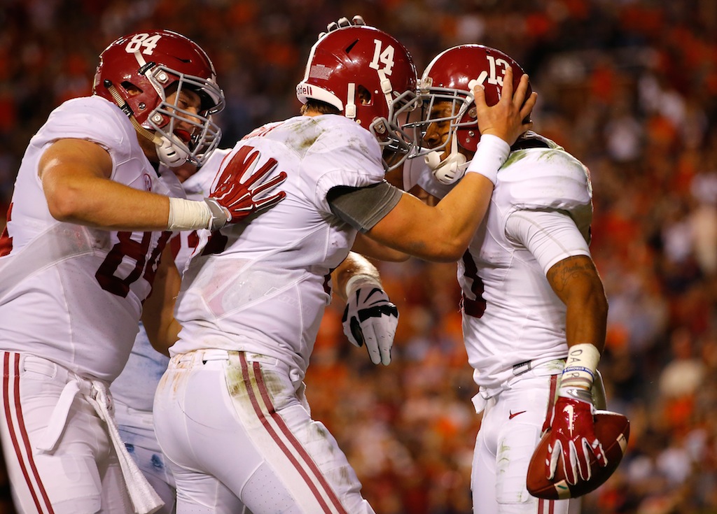 ArDarius Stewart #13 of the Alabama Crimson Tide reacts after a touchdown reception from Jake Coker #14