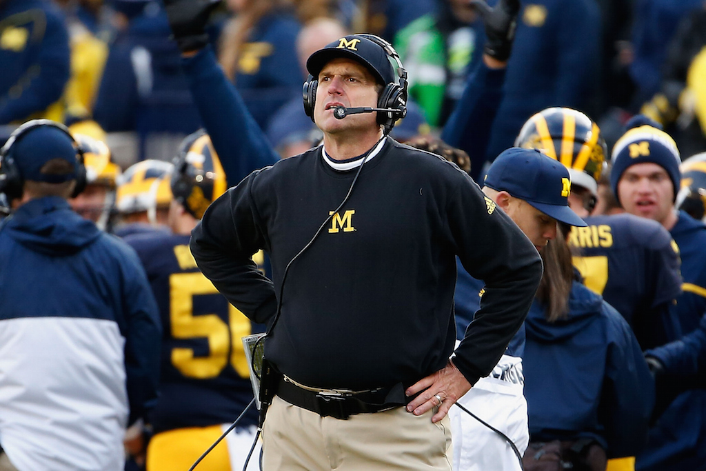 Jim Harbaugh reacts on the sidelines during a game against Michigan State