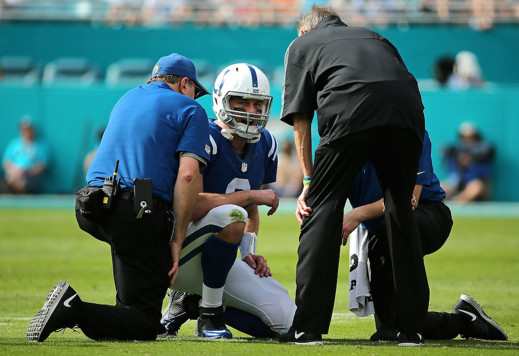 Matt Hasselbeck #8 of the Indianapolis Colts reacts to being hurt during a game against the Miami Dolphins