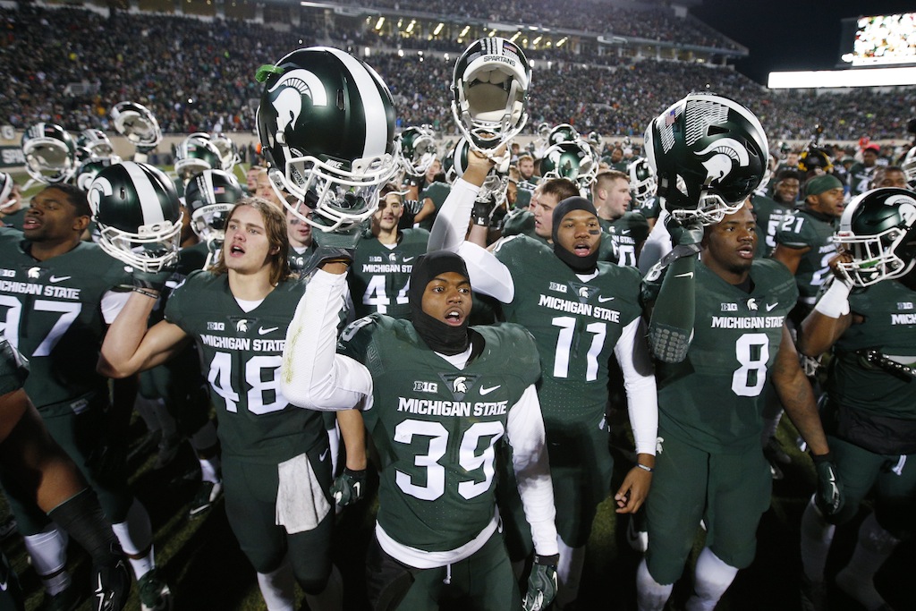 Michigan State players celebrate their victory over Penn State
