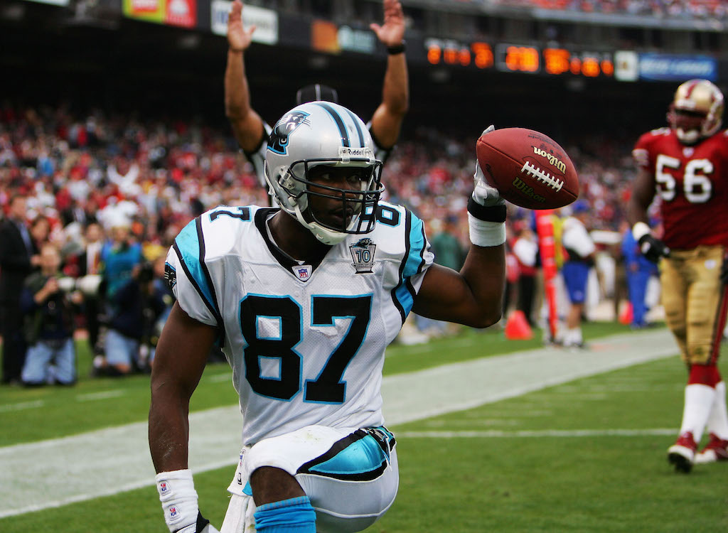 Muhsin Muhammad celebrates after catching a TD against San Francisco
