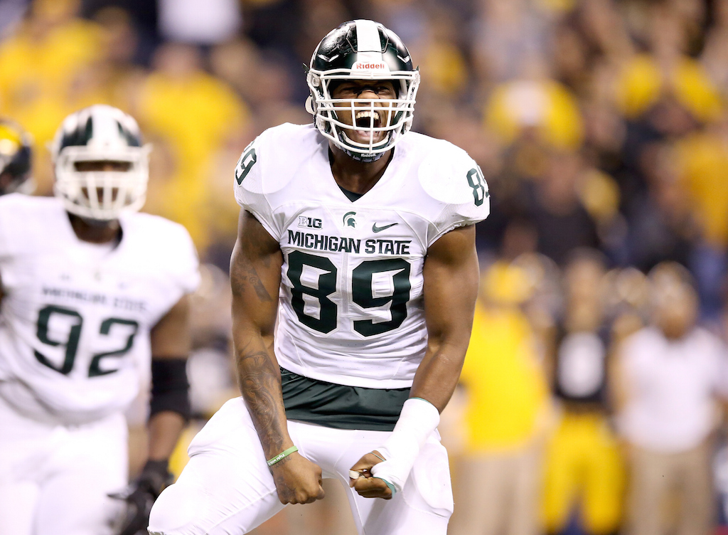 Shilique Calhoun #89 of the Michigan State Spartans celebrates after making a play against Iowa 