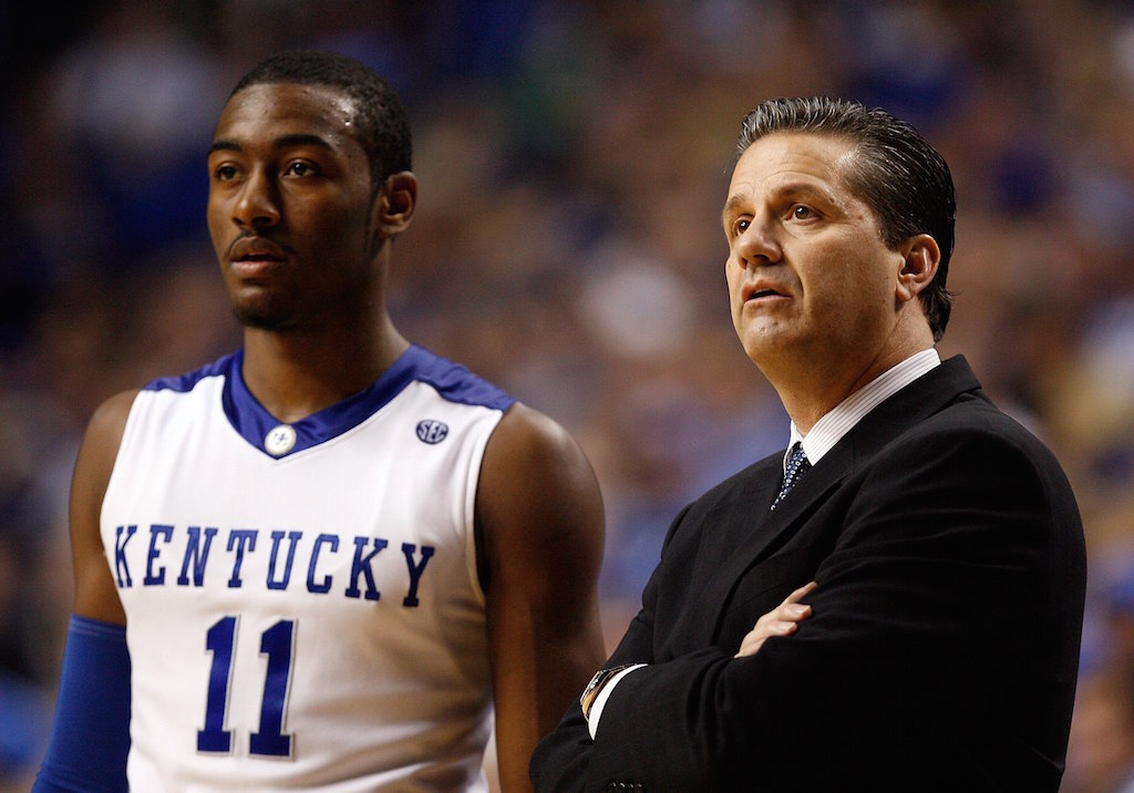 John Wall and John Calipari look on for Kentucky
