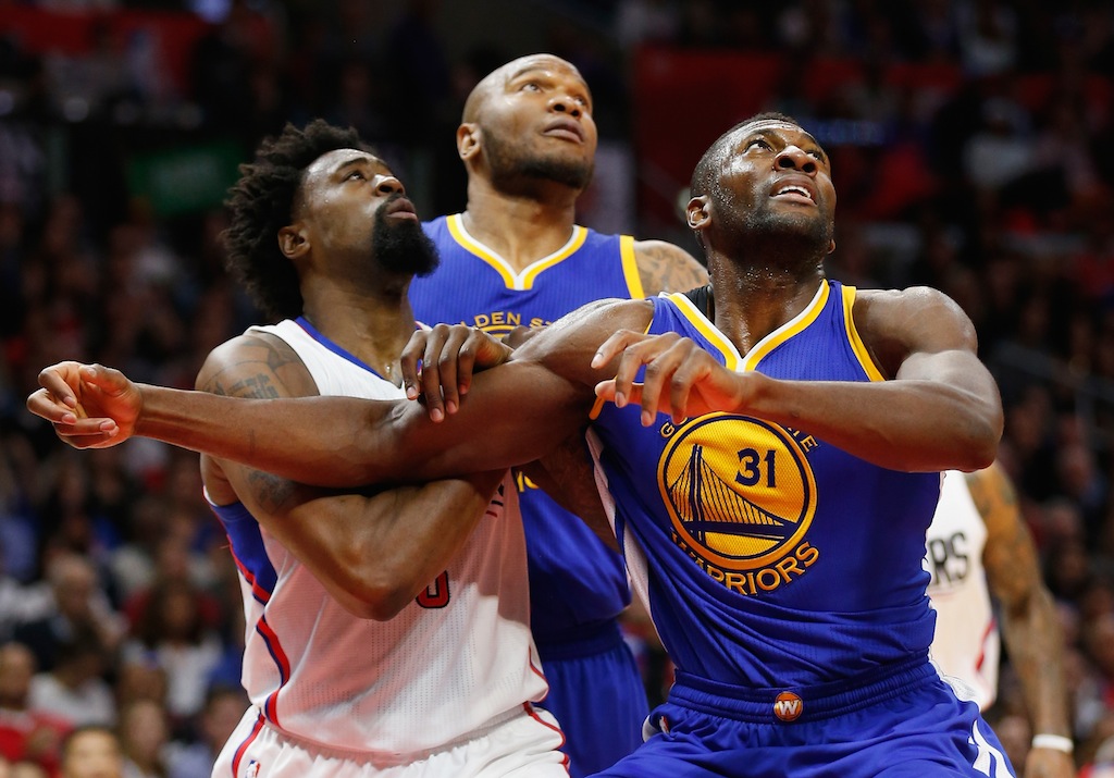 DeAndre Jordan #6 of the Los Angeles Clippers, Marreese Speights #5 of the Golden State Warriors,and Festus Ezeli #31 of the Golden State Warriors battle for position