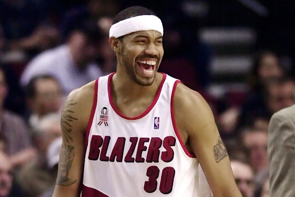 Rasheed Wallace laughs on the court.