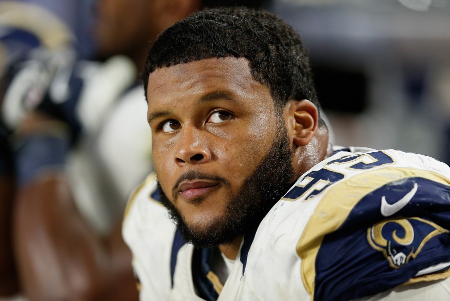 Los Angeles Rams defensive tackle Aaron Donald takes a break during a game.