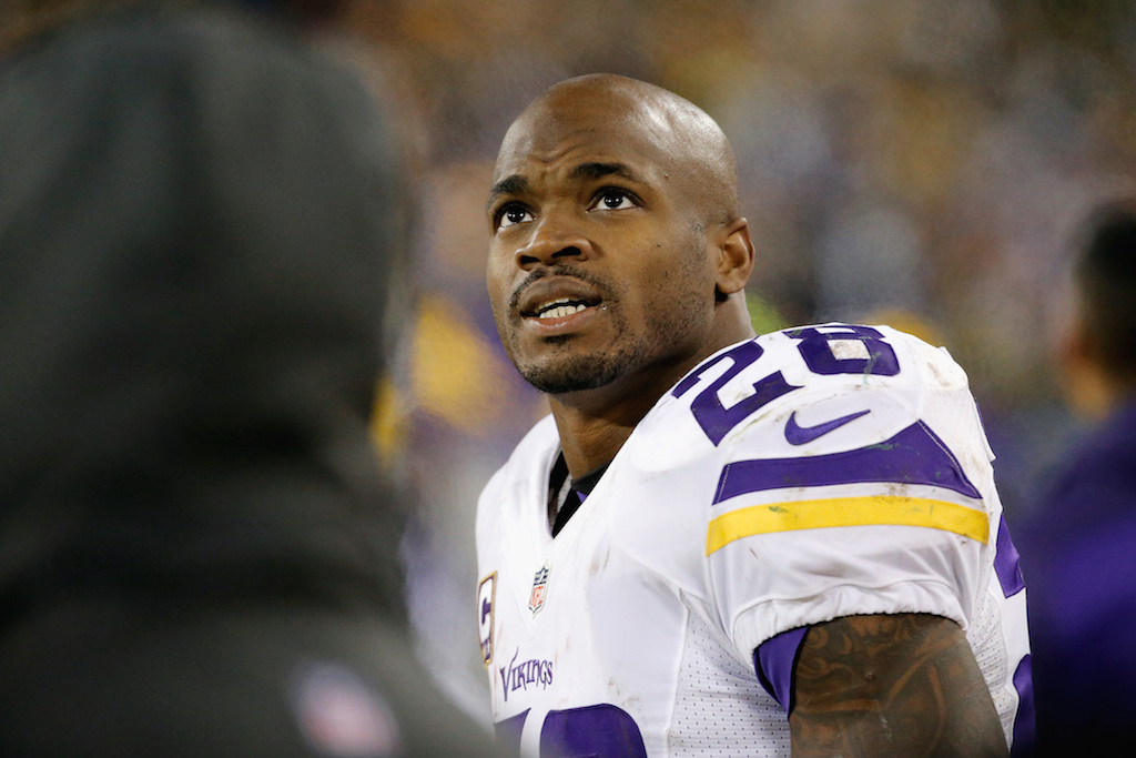 Adrian Peterson looks on during a game against the Packers