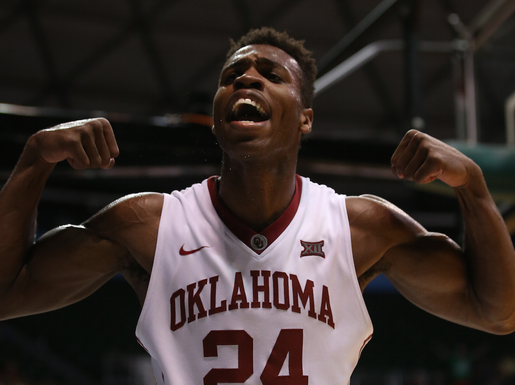 Buddy Hield #24 of the Oklahoma Sooners celebrates after making a basket