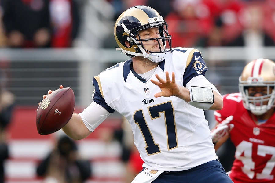 Case Keenum #17 of the St. Louis Rams throwing a football