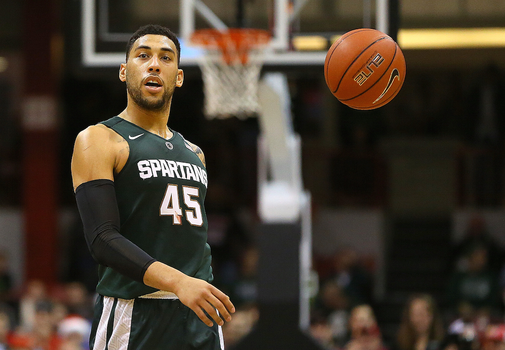 Denzel Valentine #45 of the Michigan State Spartans reacts during the final minutes of a win over the Northeastern Huskies