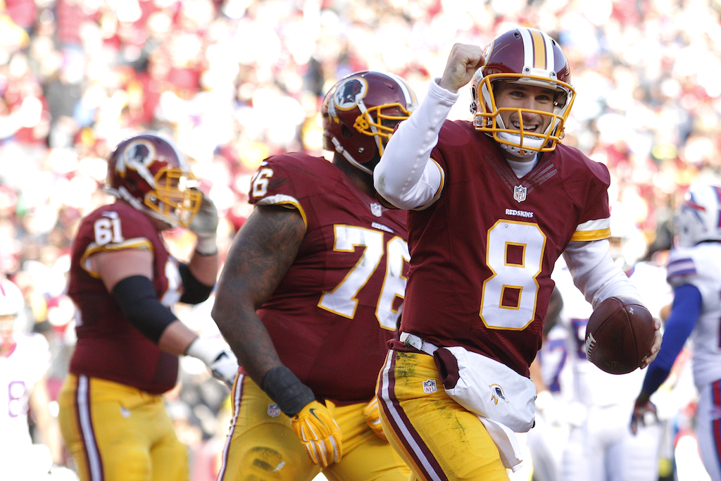 Kirk Cousins celebrates a rushing touchdown.