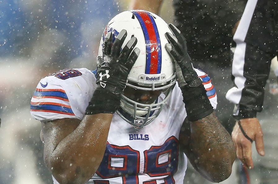 Marcell Dareus #99 of the Buffalo Bills with hands on his head
