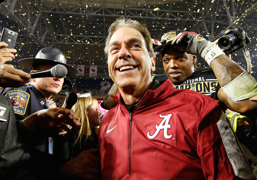 Coach Nick Saban celebrates Alabama's victory in the CFP National Championship Game