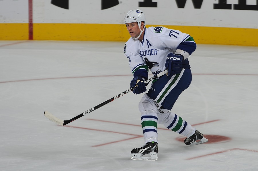 Owen Nolan #77 of the Vancouver Canucks playing a NHL game