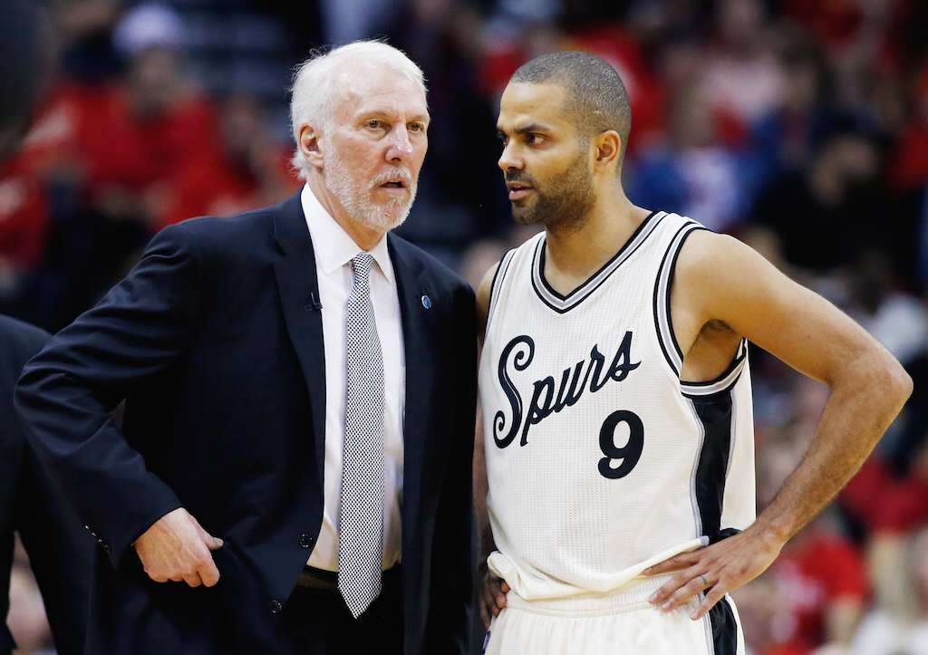 Gregg Popovich chats with Tony Parker.