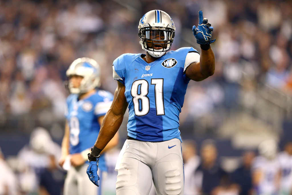 Calvin Johnson holds up a finger to the Wild Card Playoff Game
