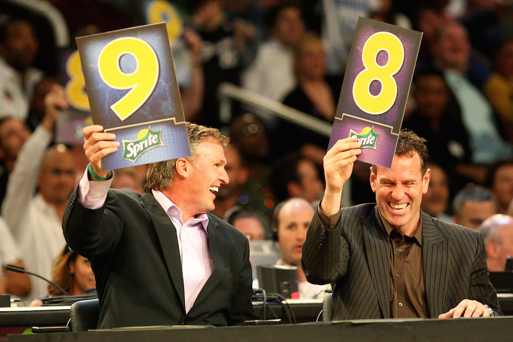 (L-R) Tom Chambers and Dan Majerle hold up scores during the Sprite Slam Dunk Contest on All-Star Saturday Night, part of 2009 NBA All-Star Weekend