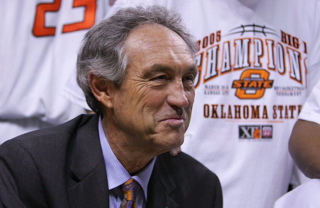 Eddie Sutton smiles after winning a championship.