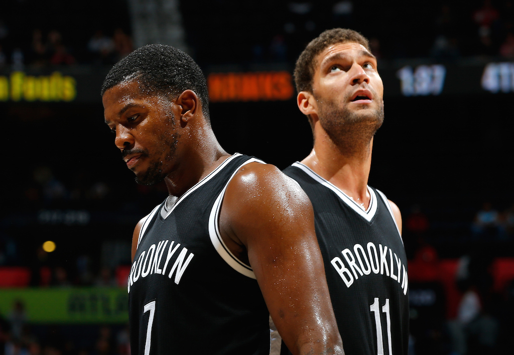 Joe Johnson #7 and Brook Lopez #11 of the Brooklyn Nets