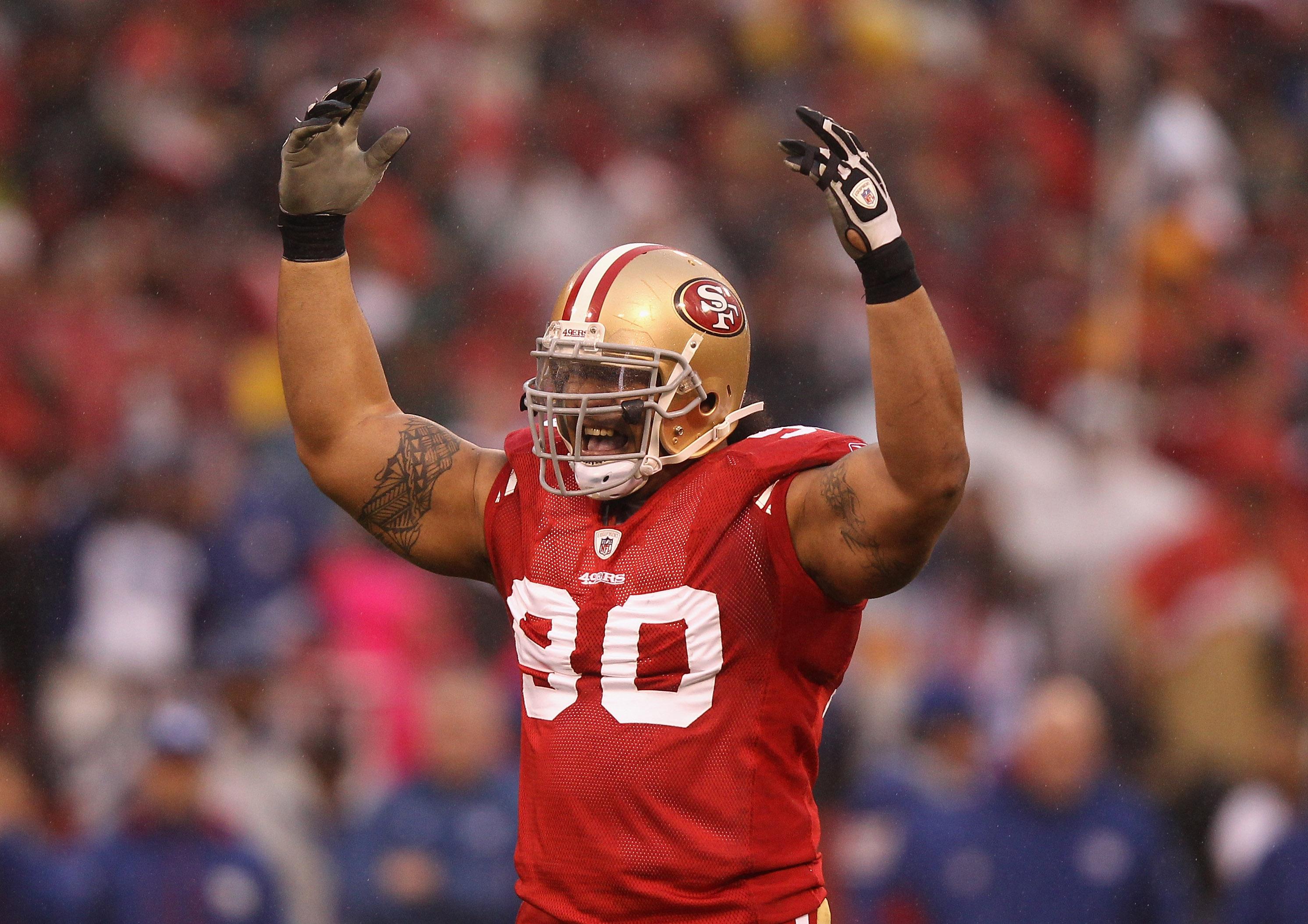 Isaac Sopoaga #90 of the San Francisco 49ers reacts against the New York Giants