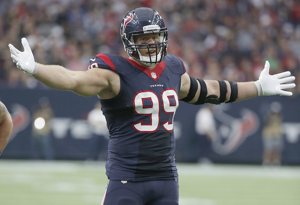 HOUSTON, TX - NOVEMBER 29: J.J. Watt #99 of the Houston Texans reatcs after making a defensive play against the New Orleans Saints in the third quarter on November 29, 2015 at NRG Stadium in Houston, Texas. (Photo by Scott Halleran/Getty Images)