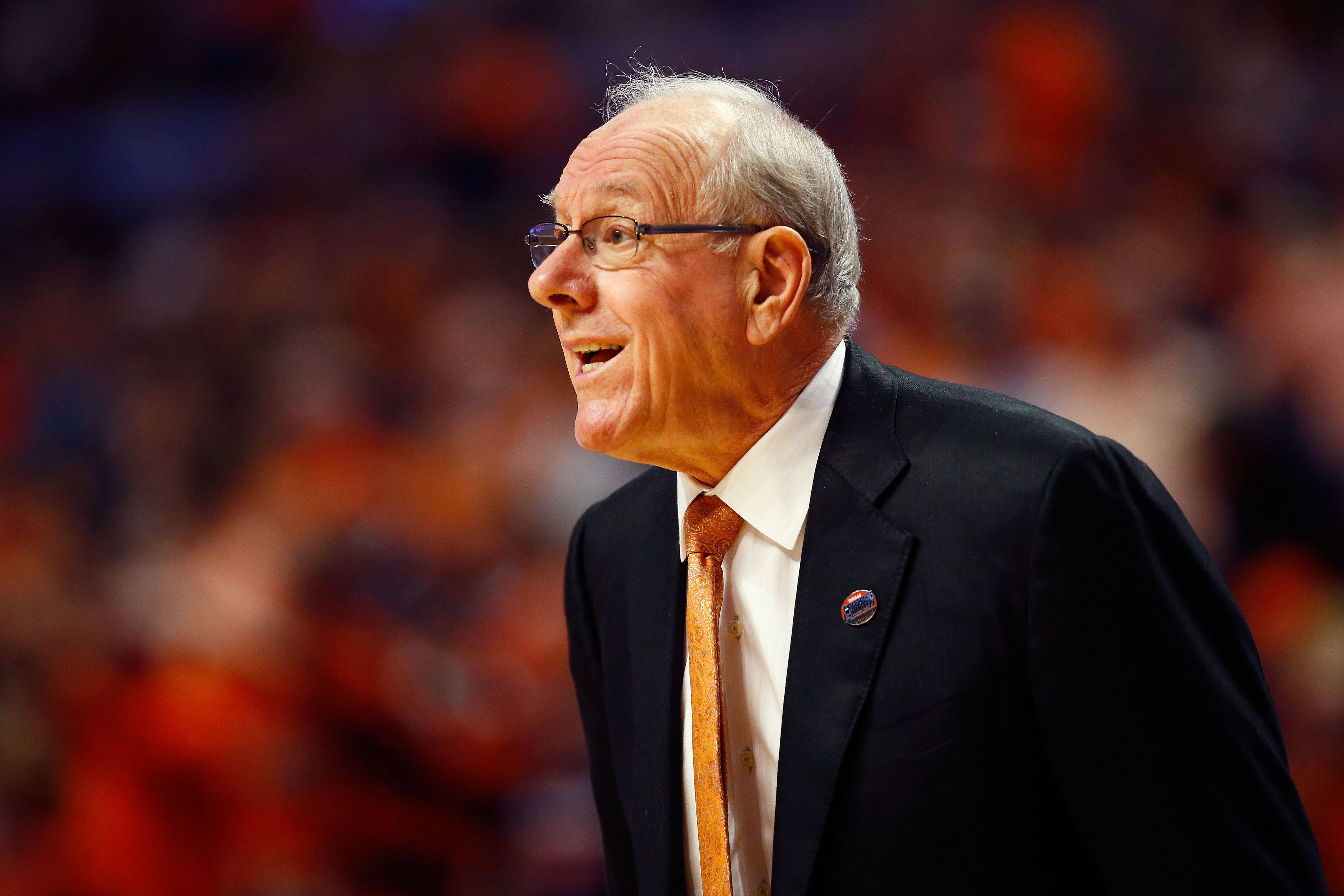 Jim Boeheim instructs his players from the sideline.