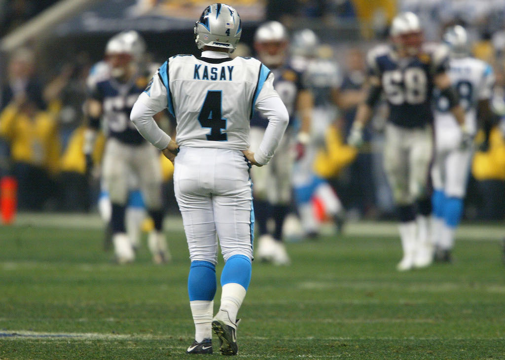 John Kasay #4 of the Carolina Panthers reacts after kicking the kick off out of bounds in the fourth quarter of Super Bowl XXXVIII