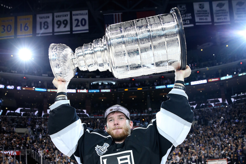 Jonathan Quick celebrates with the 2014 Stanley Cup after the Los Angeles Kings' victory against the New York Rangers.