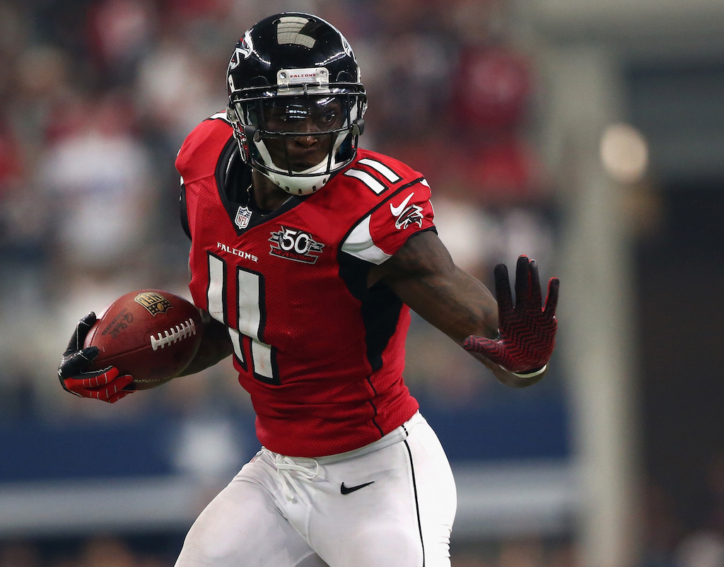 Julio Jones blocks a defender.