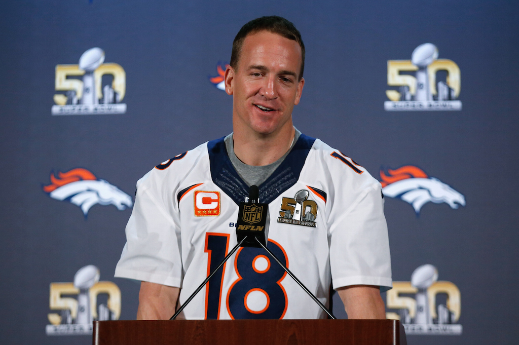 Peyton Manning #18 of the Denver Broncos speaks to the media during the Broncos media availability for Super Bowl 50