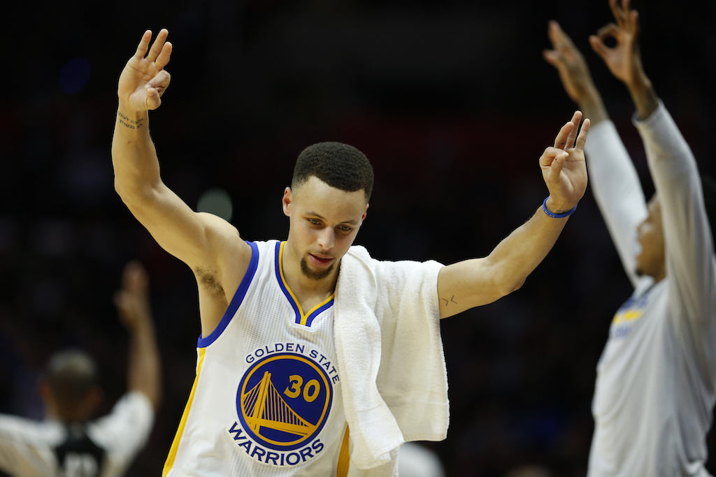 Stephen Curry celebrates in a game against the Clippers