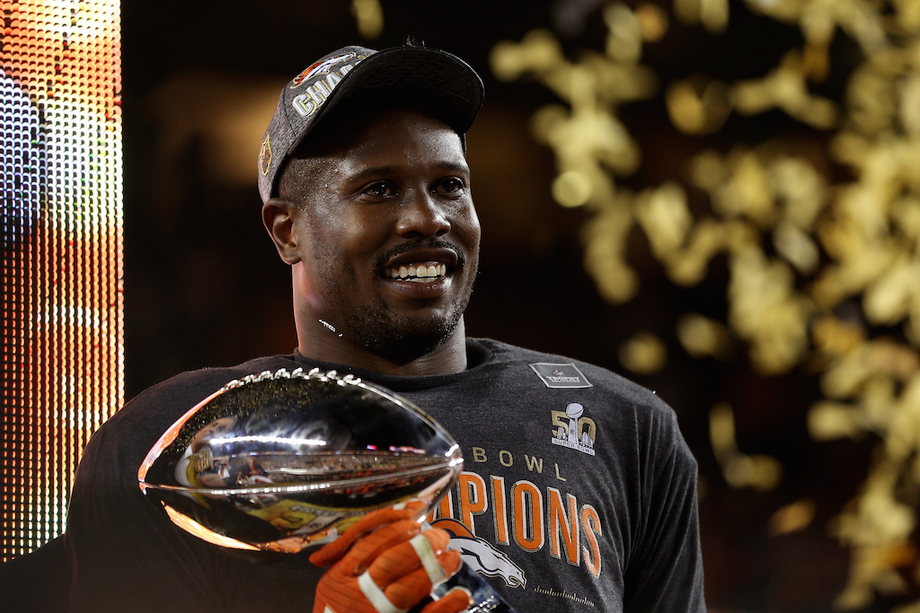 SANTA CLARA, CA - FEBRUARY 07: Super Bowl MVP Von Miller #58 of the Denver Broncos celebrates with the Vince Lombardi Trophy after winning Super Bowl 50 at Levi's Stadium on February 7, 2016 in Santa Clara, California. The Broncos defeated the Panthers 24-10. (Photo by Patrick Smith/Getty Images)