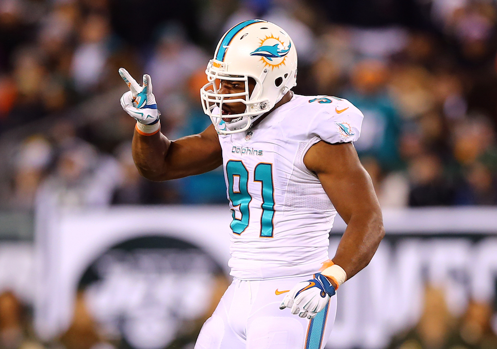 Miami Dolphins defensive end Cameron Wake celebrates a sack.