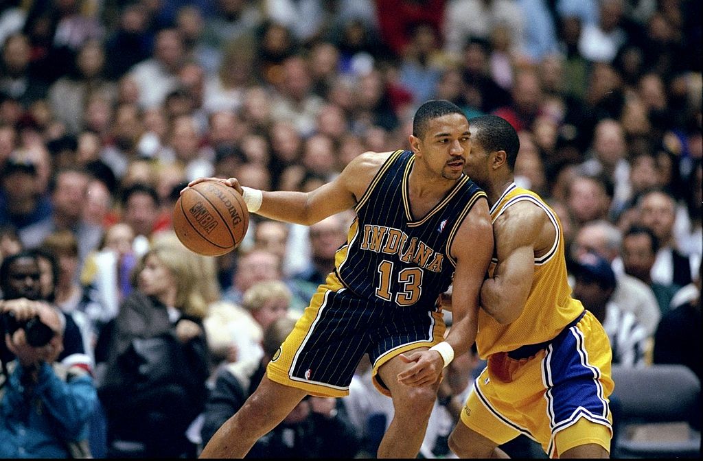 Mark Jackson posts up on Derek Fisher.