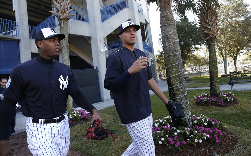 TAMPA, FL - FEBRUARY 19: Pitchers Aroldis Chapman, left, and Dellin Betances, of the New York Yankees, walk out to the field to participate in a spring training workout on February 19, 2016 at George M. Steinbrenner Field in Tampa, Florida. (Photo by Brian Blanco/Getty Images) *** Local Caption *** Aroldis Chapman, Dellin Betances