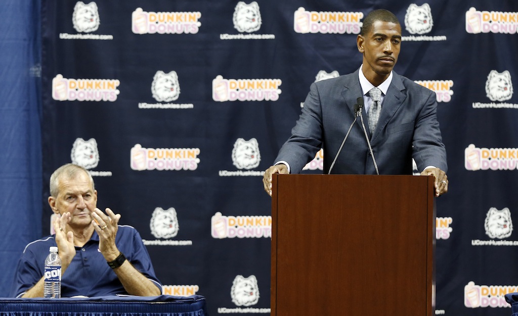 Jim Calhoun (L) announces his retirement; Kevin Ollie is named new UConn coach | Winslow Townson/Getty Images