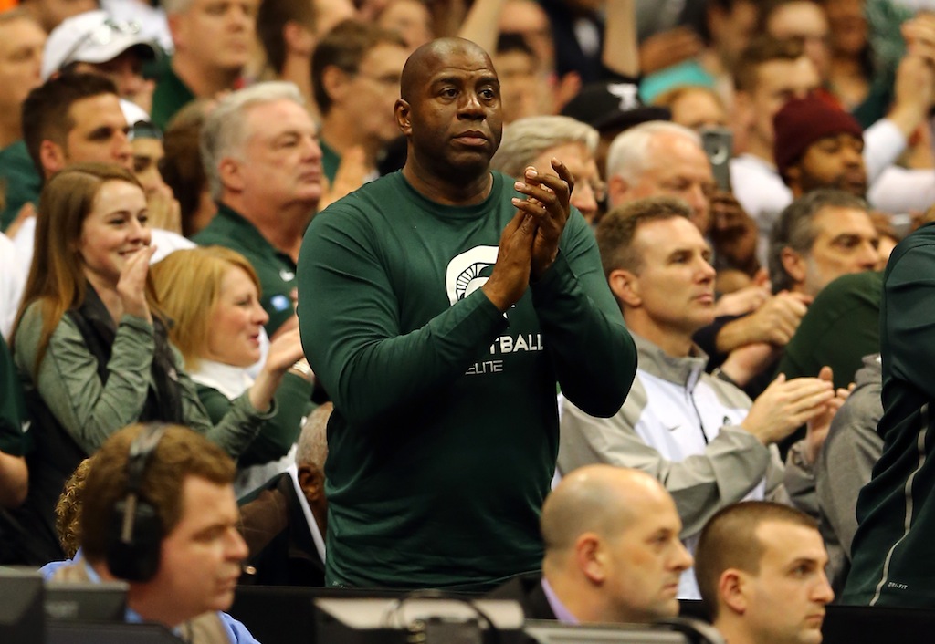 Former Spartan Magic Johnson cheers on Michigan State.