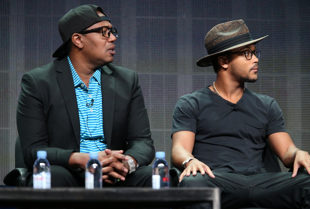 Master P (L) and Romeo Miller speak onstage during a panel discussion.