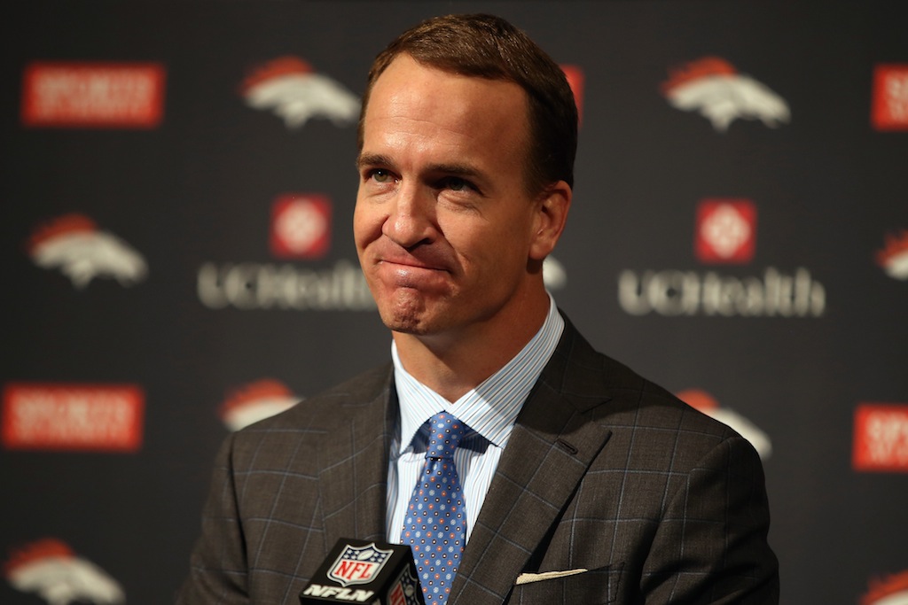 ENGLEWOOD, CO - MARCH 07: Quarterback Peyton Manning reacts as he announces his retirement from the NFL at the UCHealth Training Center on March 7, 2016 in Englewood, Colorado. Manning, who played for both the Indianapolis Colts and Denver Broncos in a career which spanned 18 years, is the NFL's all-time leader in passing touchdowns (539), passing yards (71,940) and tied for regular season QB wins (186). Manning played his final game last month as the winning quarterback in Super Bowl 50 in which the Broncos defeated the Carolina Panthers, earning Manning his second Super Bowl title. (Photo by Doug Pensinger/Getty Images)