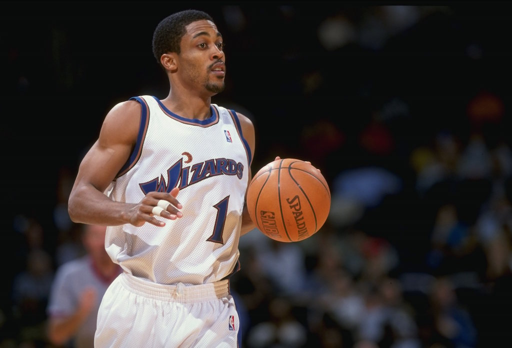 Rod Strickland of the Washington Wizards dribbles the ball.