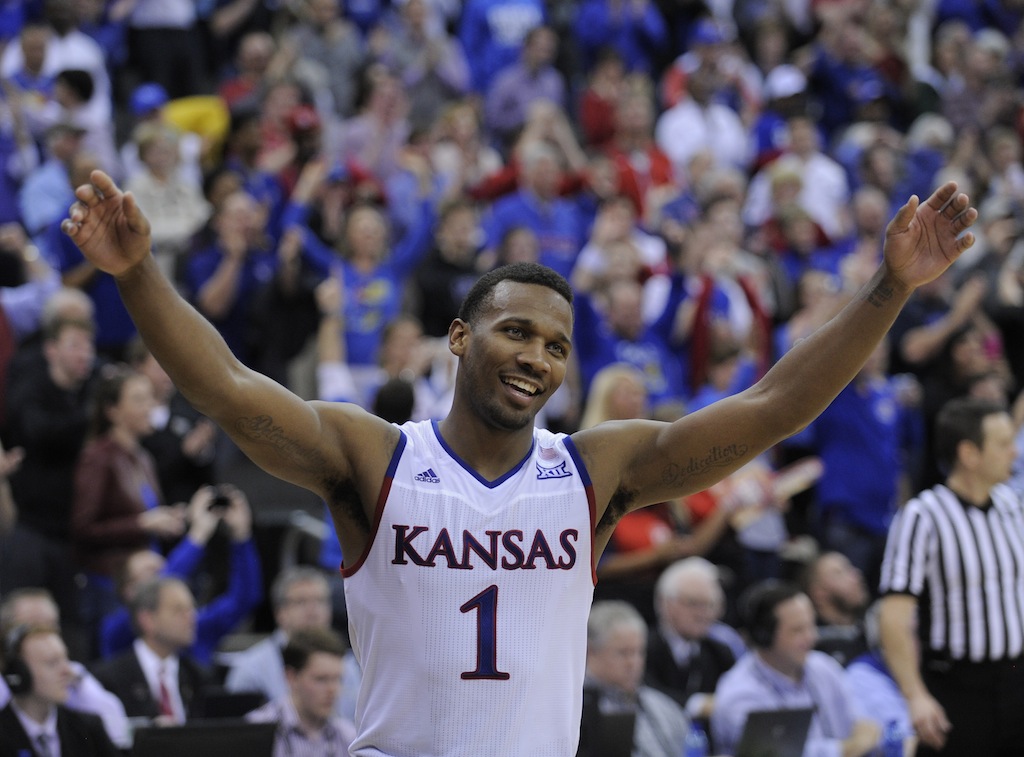 Wayne Selden Jr. celebrates winning the Big 12 tournament