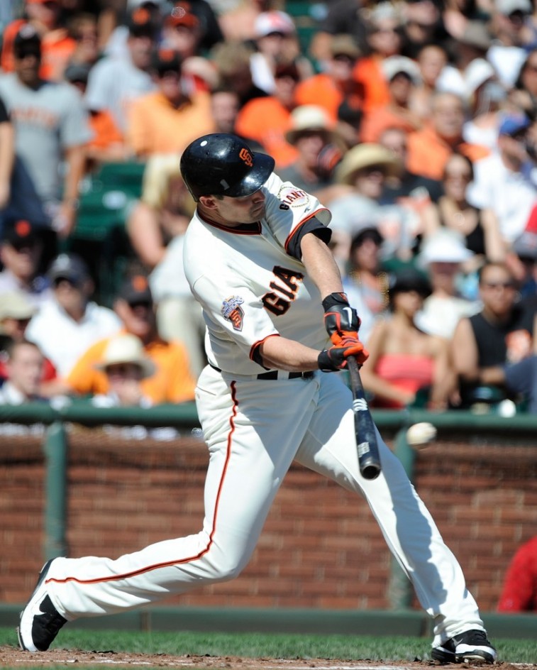 San Francisco Giants player Pat Burrell hits the baseball