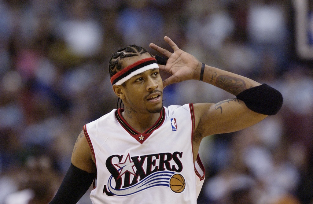 Allen Iverson of the Philadelphia 76ers gestures to hear cheers from the crowd during the NBA game against the Washington Wizards.