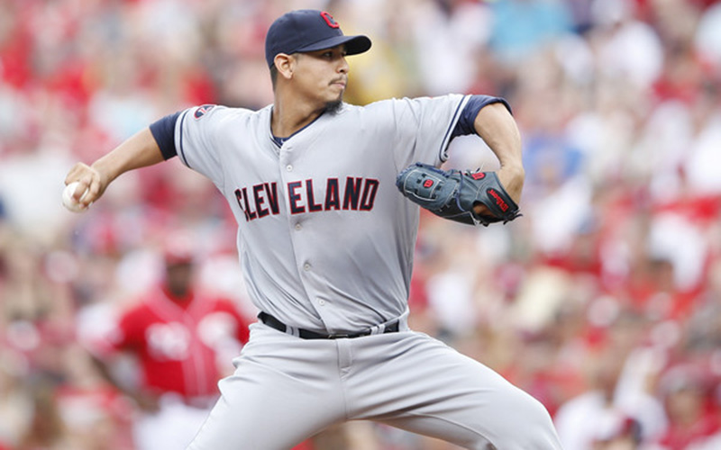 Carlos Carrasco pitches against the Cincinnati Reds.