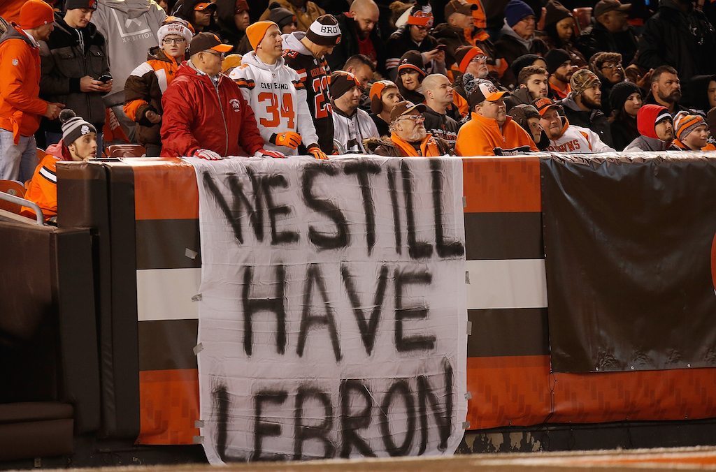 Cleveland Browns fans commiserate during a game.