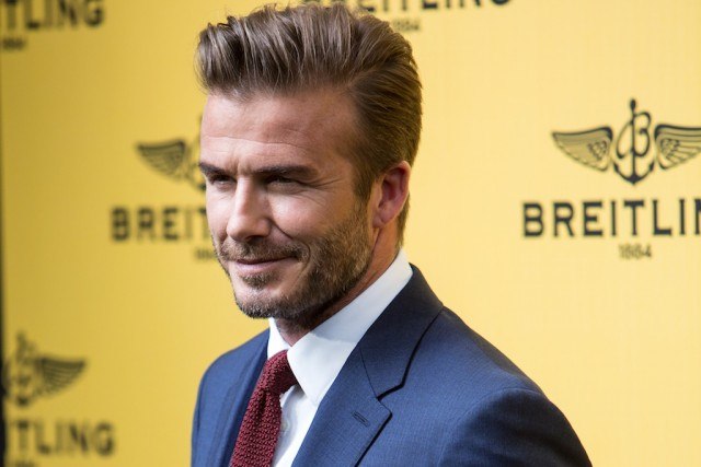 David Beckham poses for the cameras. David Beckham attends a Breitling Boutique event.